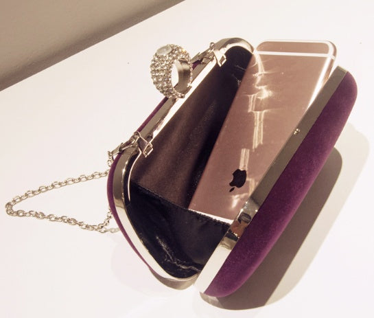 Sleek Suede Evening Bag with Ornate Clasp and Chain