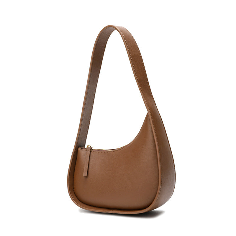 Leather Handbag with Assymetrical Saddle Design