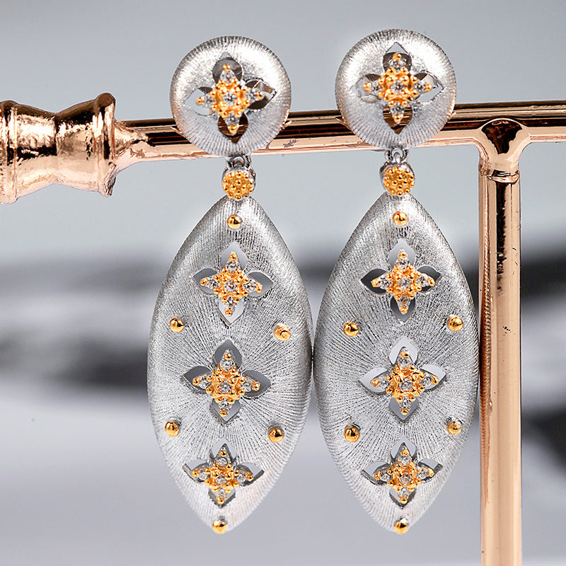 Sterling Silver Zircon Earrings with Fleur de Lis Motif