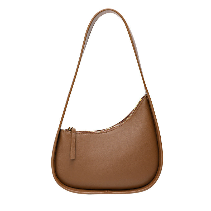 Leather Handbag with Assymetrical Saddle Design