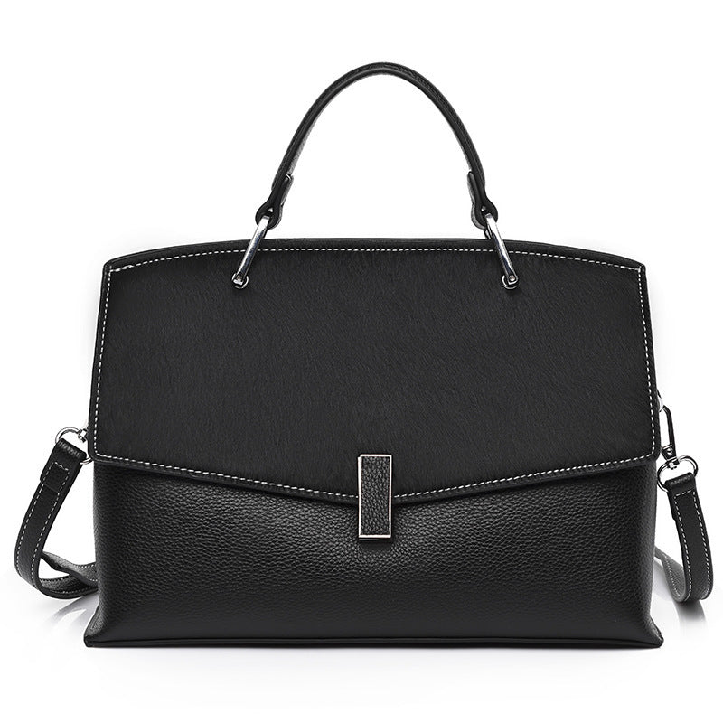 Spacious Black Leather Commuter Bag with Textured Flap and Rectangular Clasp